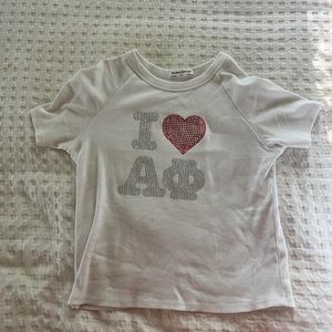 Brand new Alpha Phi baby tee runs small fits more like a Medium Or Large